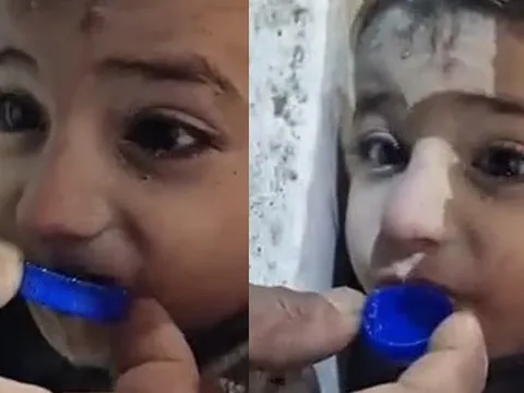 Nhói lòng hình ảnh cậu bé nhấp từng ngụm nước bằng nắp chai để duy trì sự sống, 45 giờ chiến đấu kiên cường