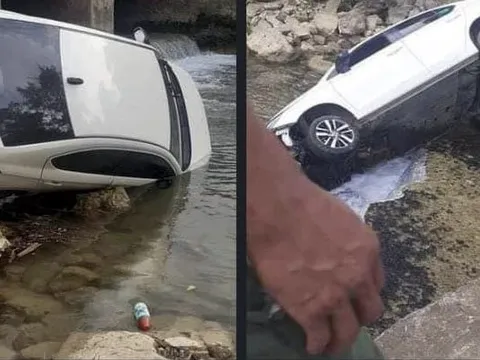 Ảnh TNGT: Lạ đường, tài xế Honda City lao thẳng xuống suối